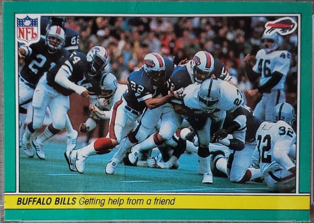 1984 Fleer Team Action Buffalo Bills [Getting Help From A Friend] #6 card