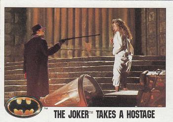 1989 Topps Batman The Joker takes a Hostage #111 card