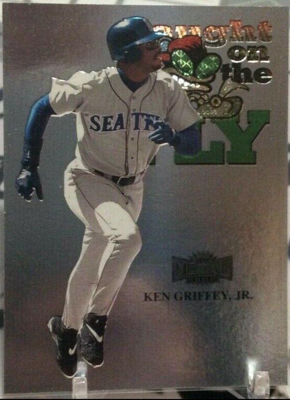 1999 Metal Universe Ken Griffey Jr. [Caught on the Fly] #233 card