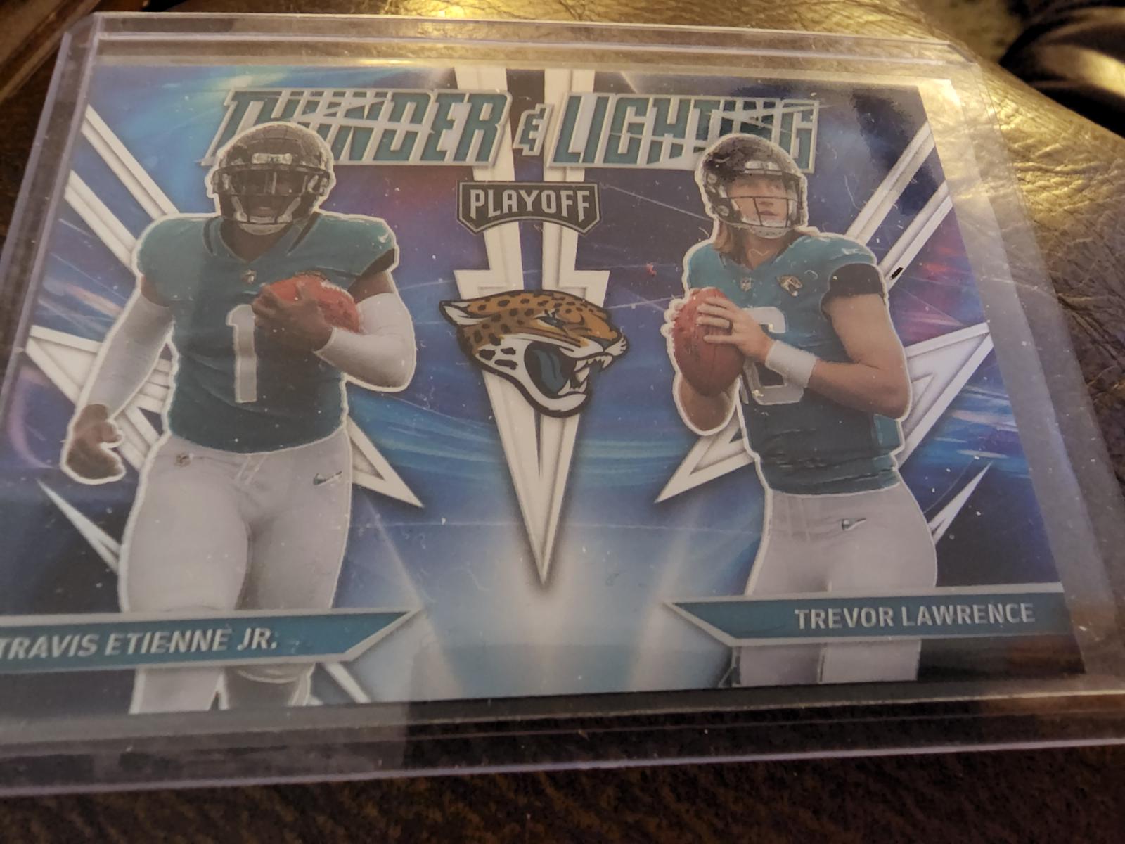 2021 Panini Playoff Thunder & Lightning Travis Etienne Jr, Trevor Lawrence #TL-17 card