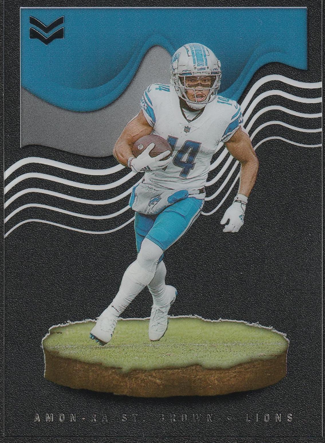2022 Panini Chronicles Magnitude Amon Ra St. Brown #MAG-23 card