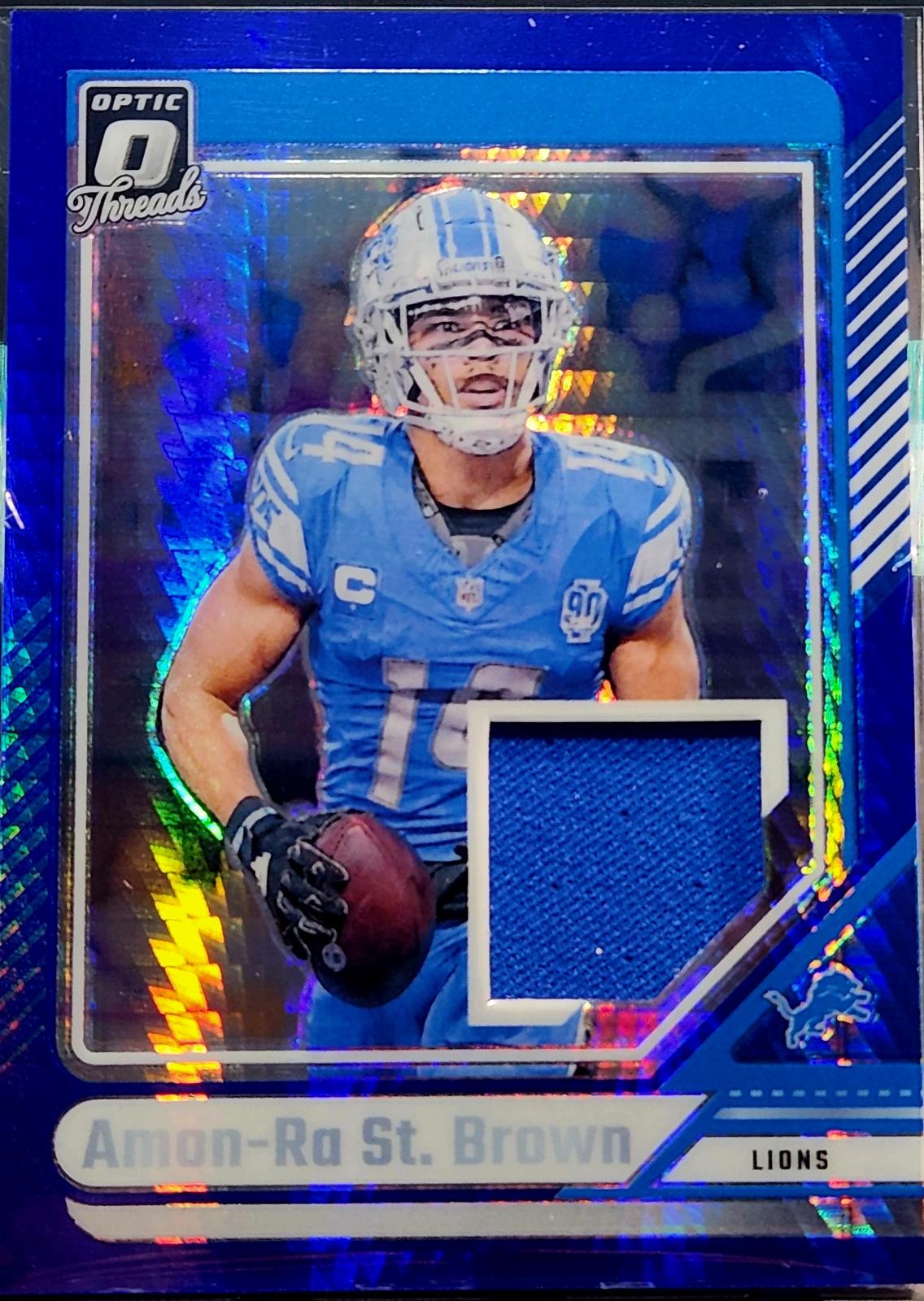 2024 Panini Donruss Optic Threads Blue Hyper Amon-Ra St. Brown #DTB-ASB card