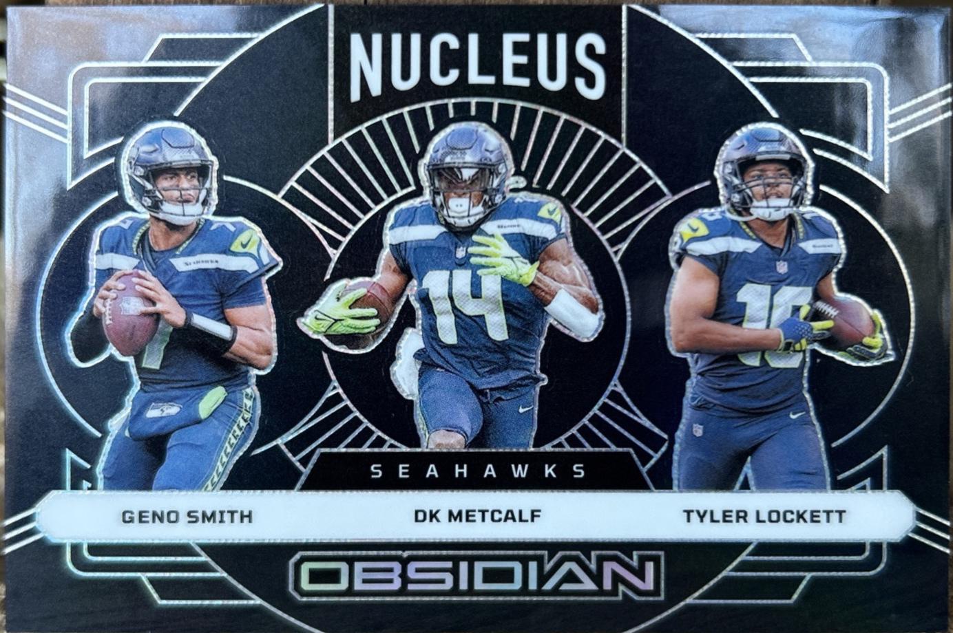 2024 Panini Obsidian Nucleus DK Metcalf / Geno Smith / Tyler Lockett #22 card