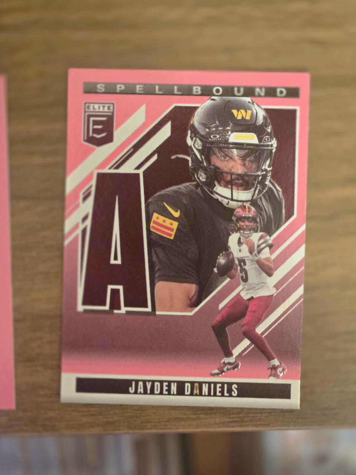 2025 Panini Donruss Elite Spellbound Jayden Daniels [Pink] #8 card
