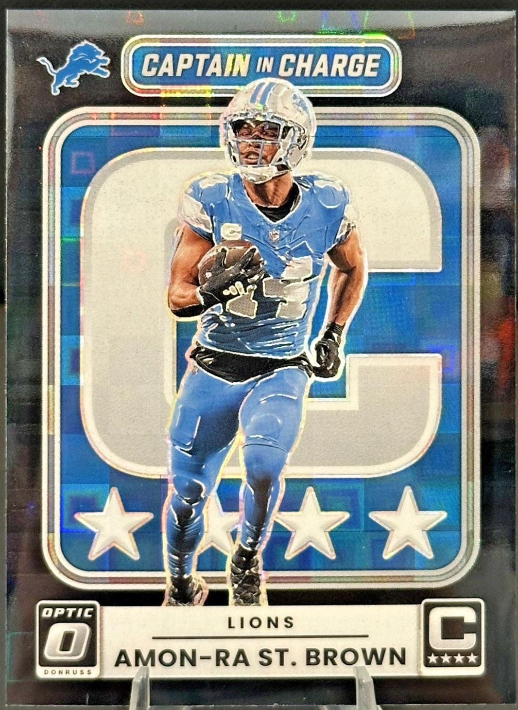2025 Panini Donruss Optic Captain in Charge Amon-Ra St. Brown [Black Pandora] #2 card