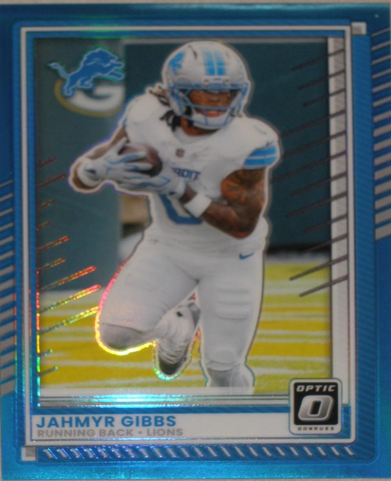 2025 Panini Donruss Optic Jahmyr Gibbs [Neon Blue] #79 card