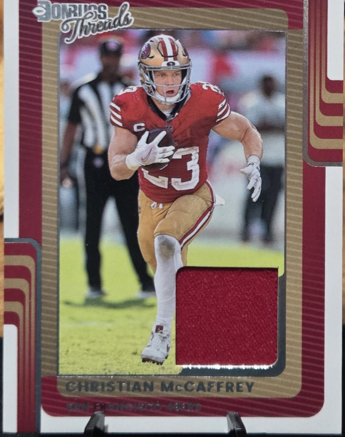 2025 Panini Donruss Threads Christian McCaffrey #DTH-CMY card