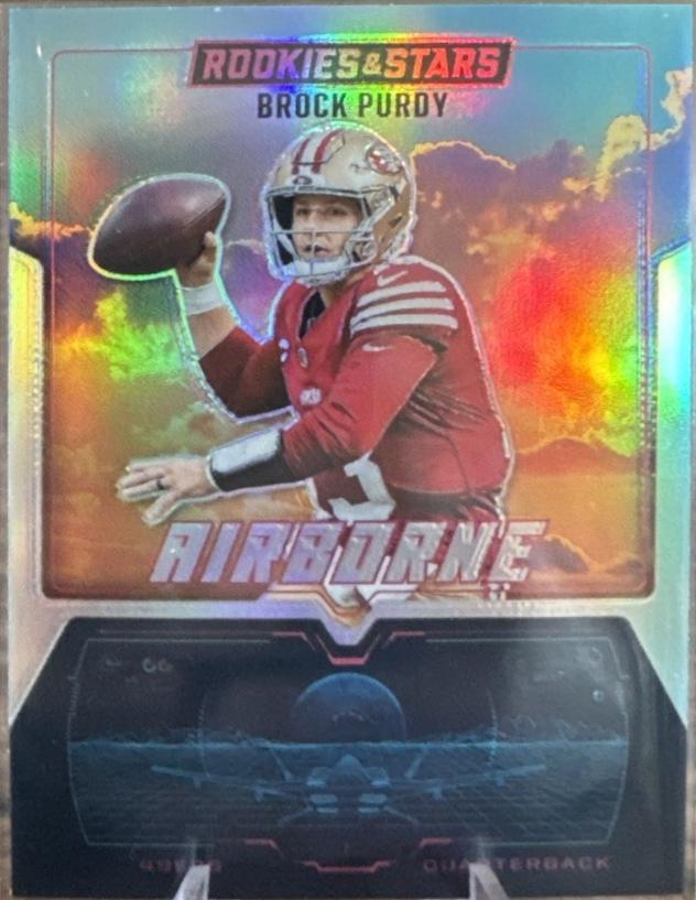 2025 Panini Rookies & Stars Airborne Brock Purdy #21 card