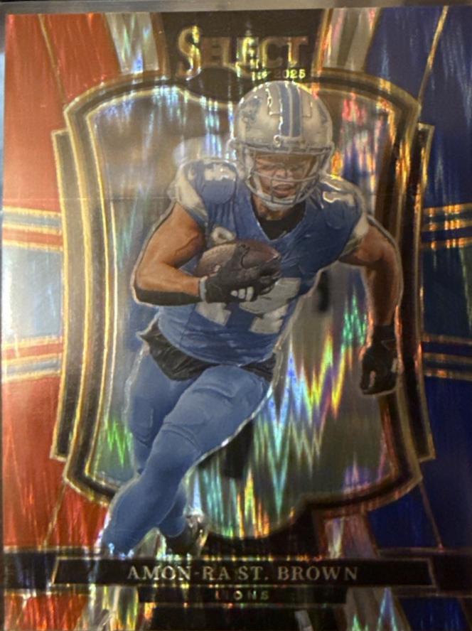 2025 Panini Select Amon-Ra St. Brown [Red Blue Prizm Shock] #170 card